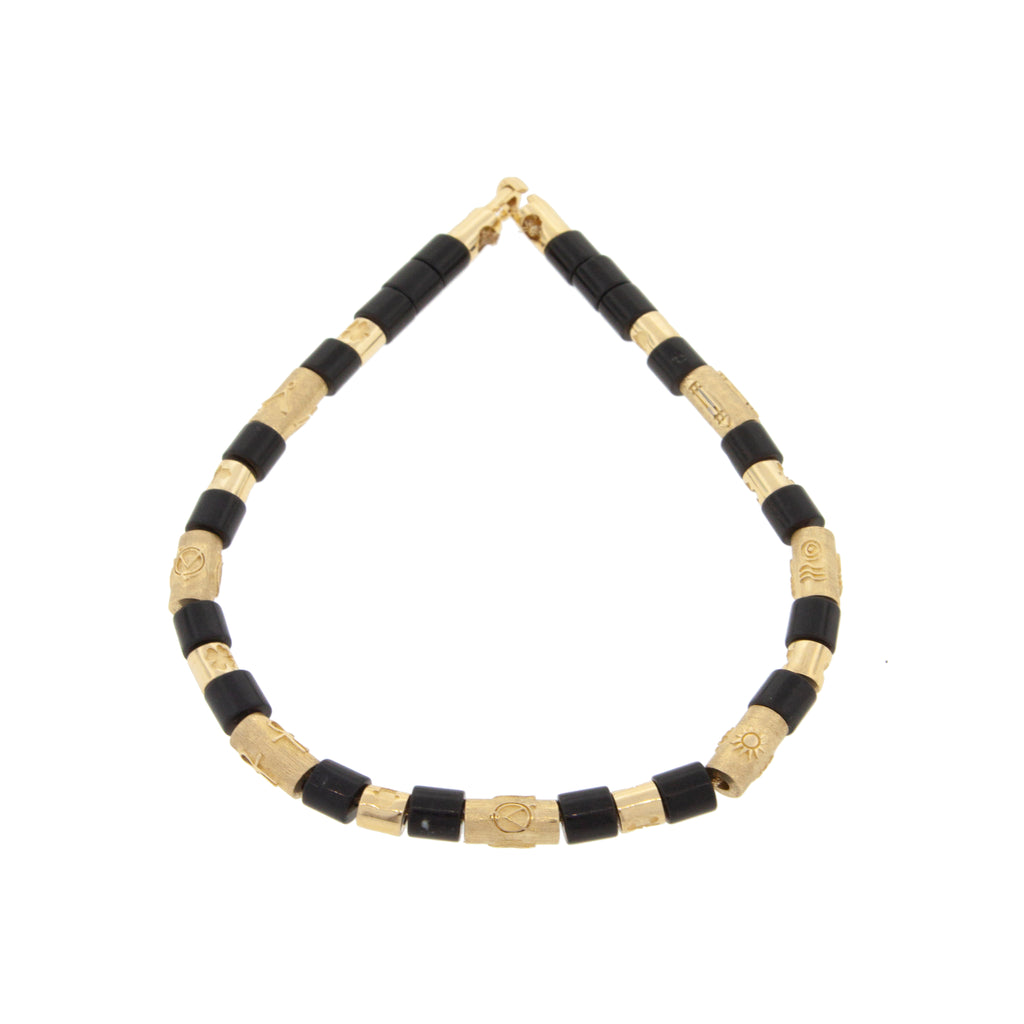 14k Yellow Gold Multi Symbol Cylinders and Onyx Short Rolls on a Beaded Bracelet with hook clasp