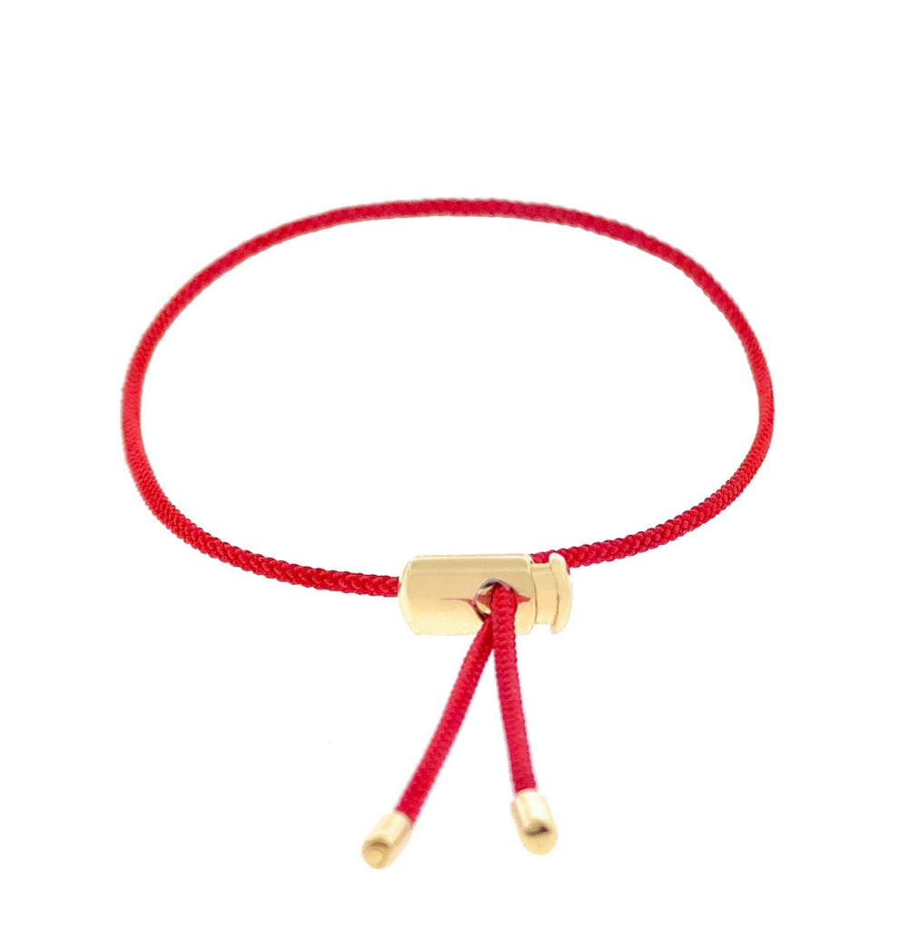LUIS MORAIS 14K yellow gold push cord bracelet with bullet tip ends. Adjustable.