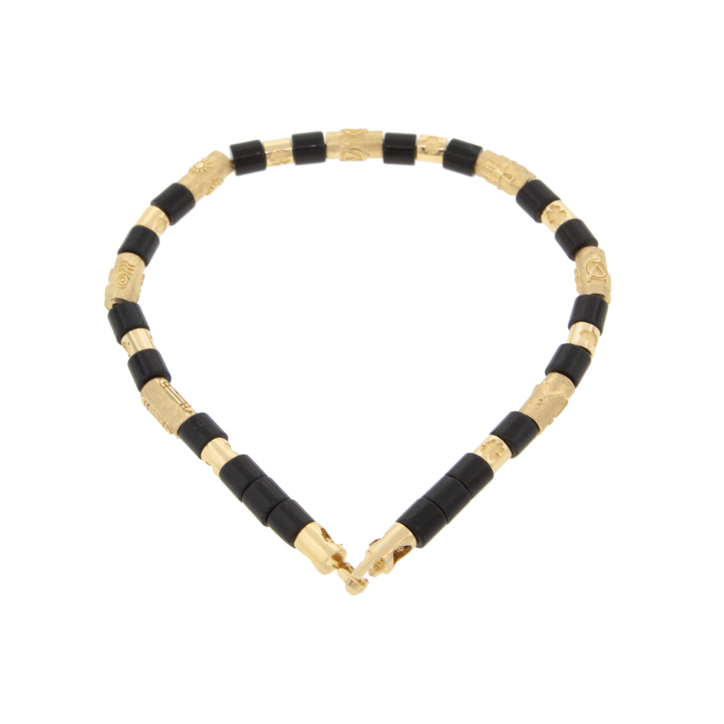 14k Yellow Gold Multi Symbol Cylinders and Onyx Short Rolls on a Beaded Bracelet with hook clasp