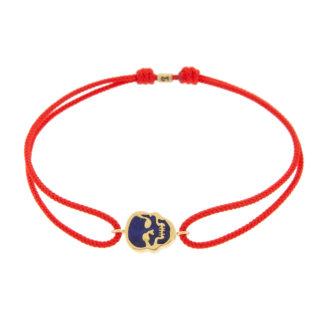 LUIS MORAIS 14K yellow gold 'The Good Times' small skull face medallion with a lapis gemstone backing on a red cord bracelet