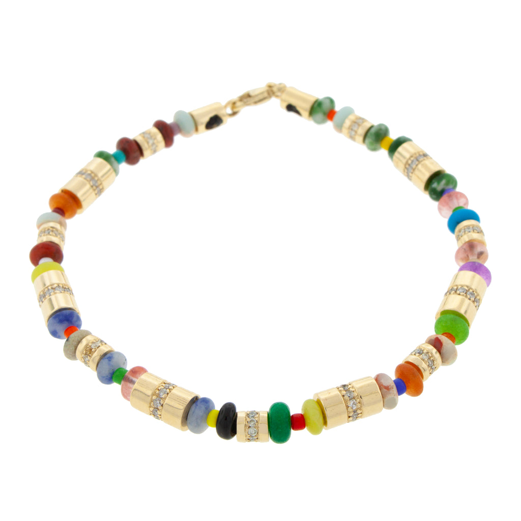 LUIS MORAIS 14K yellow gold long and short rolls with white diamonds on a multi gemstone and glass beaded bracelet with a long clasp.