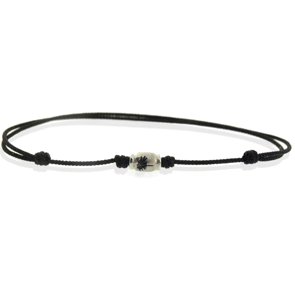 LUIS MORAIS 14K white gold antiqued palm tree on an adjustable cord bracelet.
