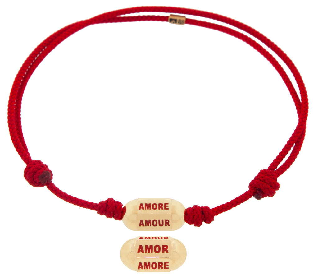 Amor, Amore, Amour Perle hexagonale sur un bracelet cordon