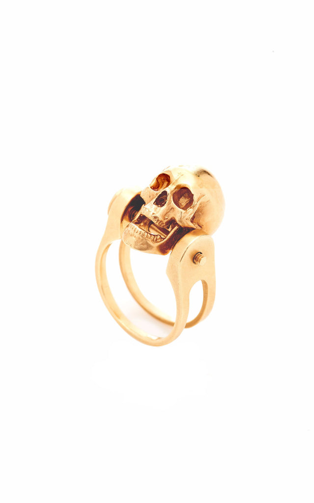 Crâne en or avec anneau de mâchoire mobile
