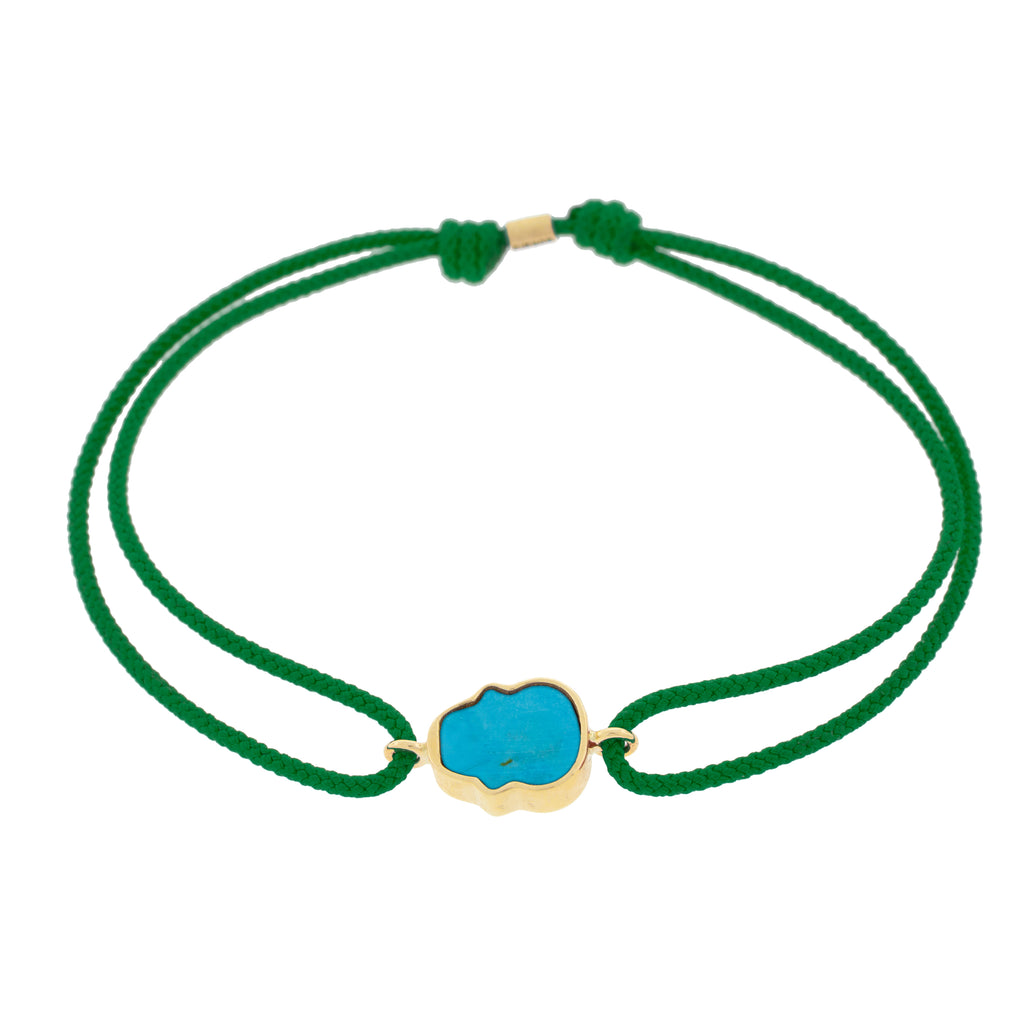 LUIS MORAIS 14K yellow gold 'The Good Times' small skull face medallion with a turquoise gemstone backing on an evergreen cord bracelet back photo