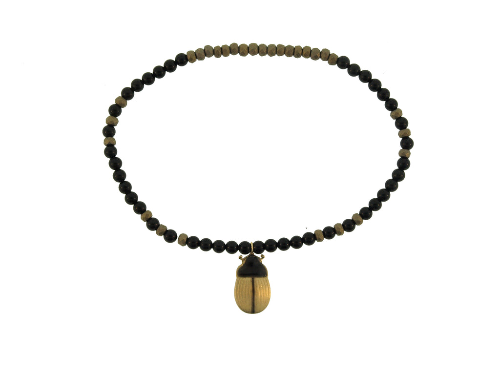 Gold Enameled Scarab On Beaded Bracelet